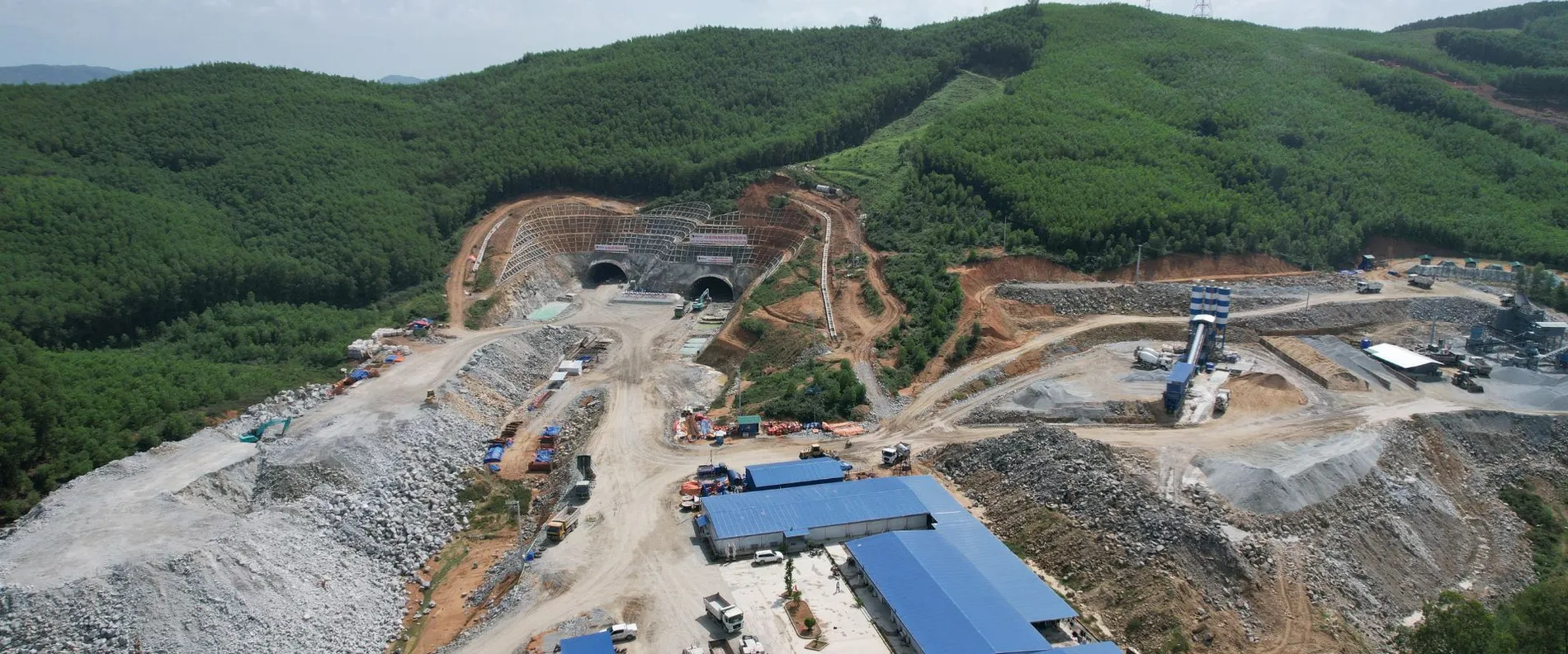 View of the large construction site with mobile concrete mixing plant.
