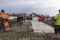 Concreting and smoothing.