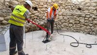 Contractors are carrying out precise drilling and grouting work to stabilise the tower’s foundation and secure the structure. 