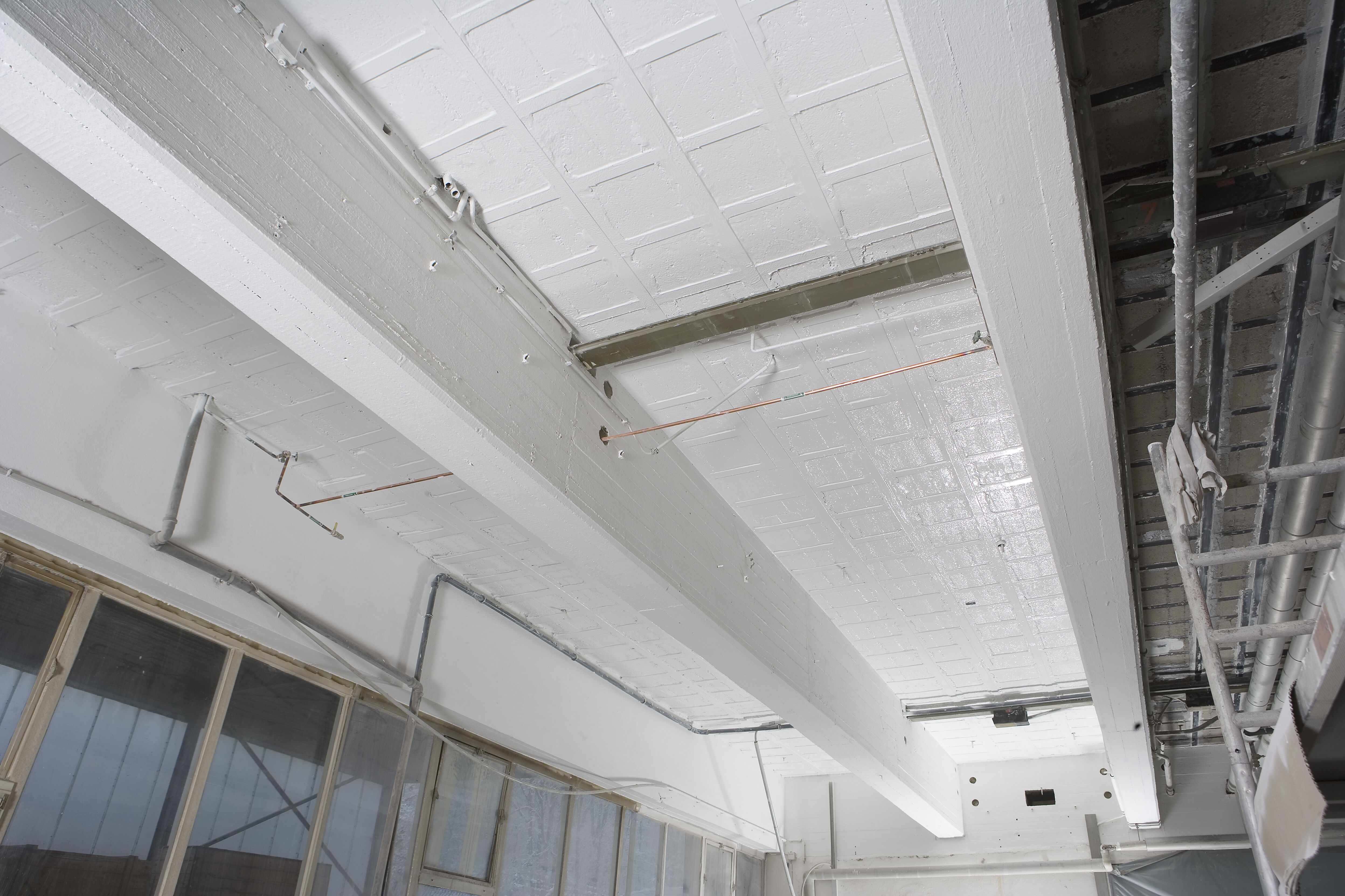 Retrofitting structural elements with CFRP systems