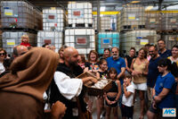 View of a ‘medieval group’ interacting with the families as part of the family games
