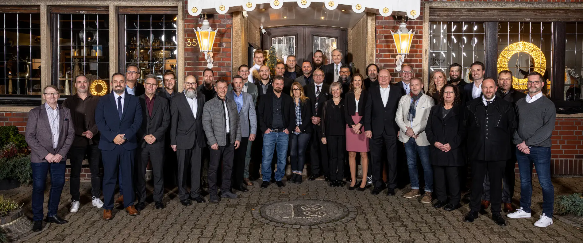 Our long-service awardees in front of the Gasthof Berger