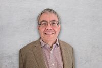 Portrait of Graham Dean General Manager of MC Uganda