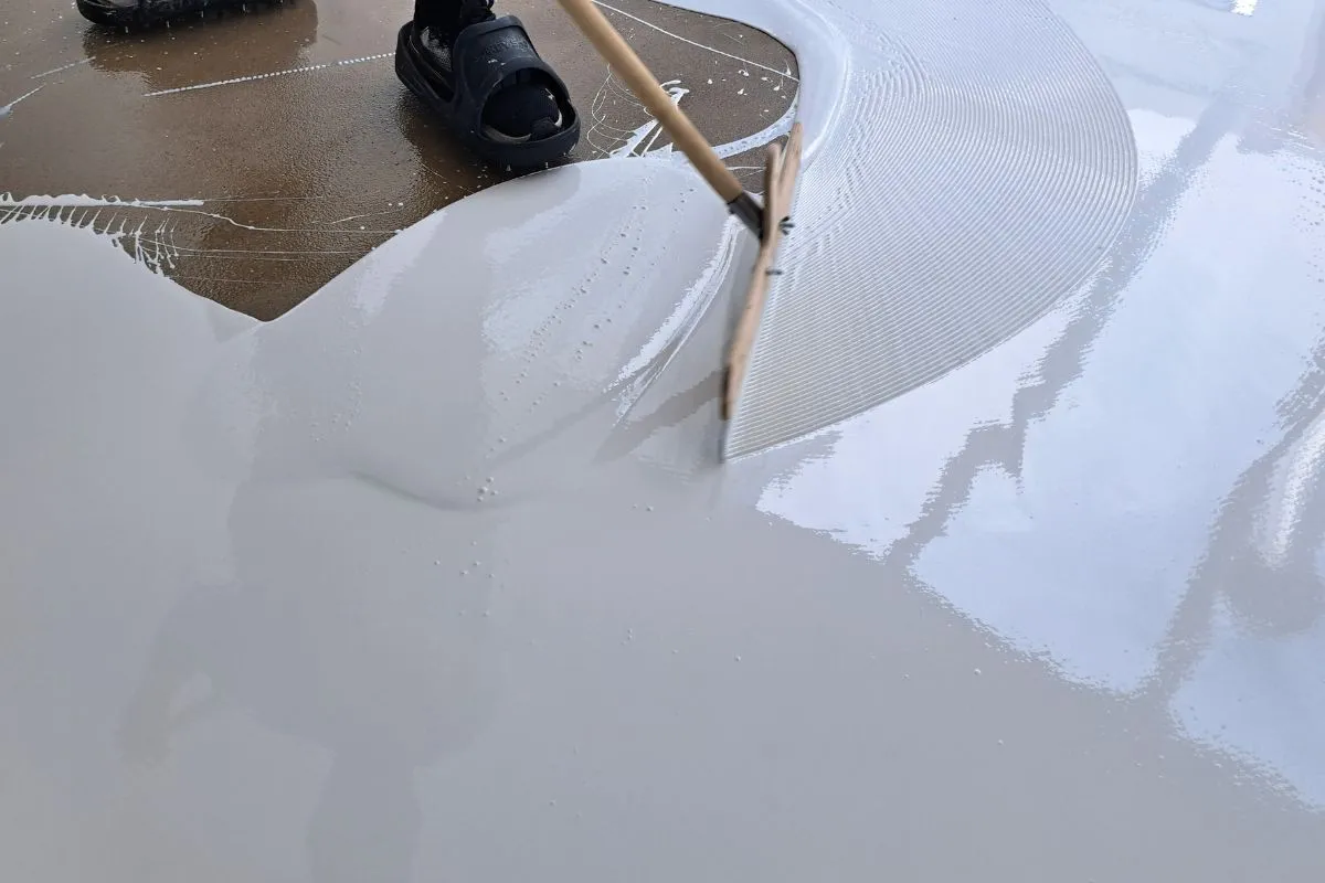 MC-DUR 2060 UV flow is applied using a squeegee