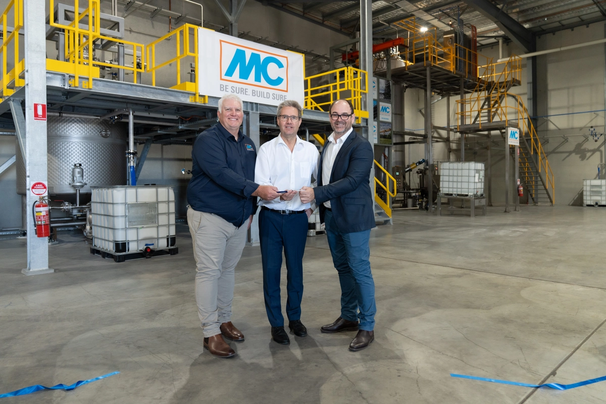 The photo shows Darren Maguire, Operations Manager at MC-Bauchemie Australia, Dr. Ekkehard zur Mühlen, Managing Director of the MC Group, and Jason Bolt, General Manager of MC-Bauchemie Australia, during the official opening of the new Adelaide production facility.