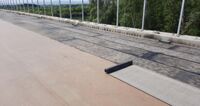 Bituminous membranes were welded onto the substrate thus prepared, before the surface was covered with rolled asphalt.