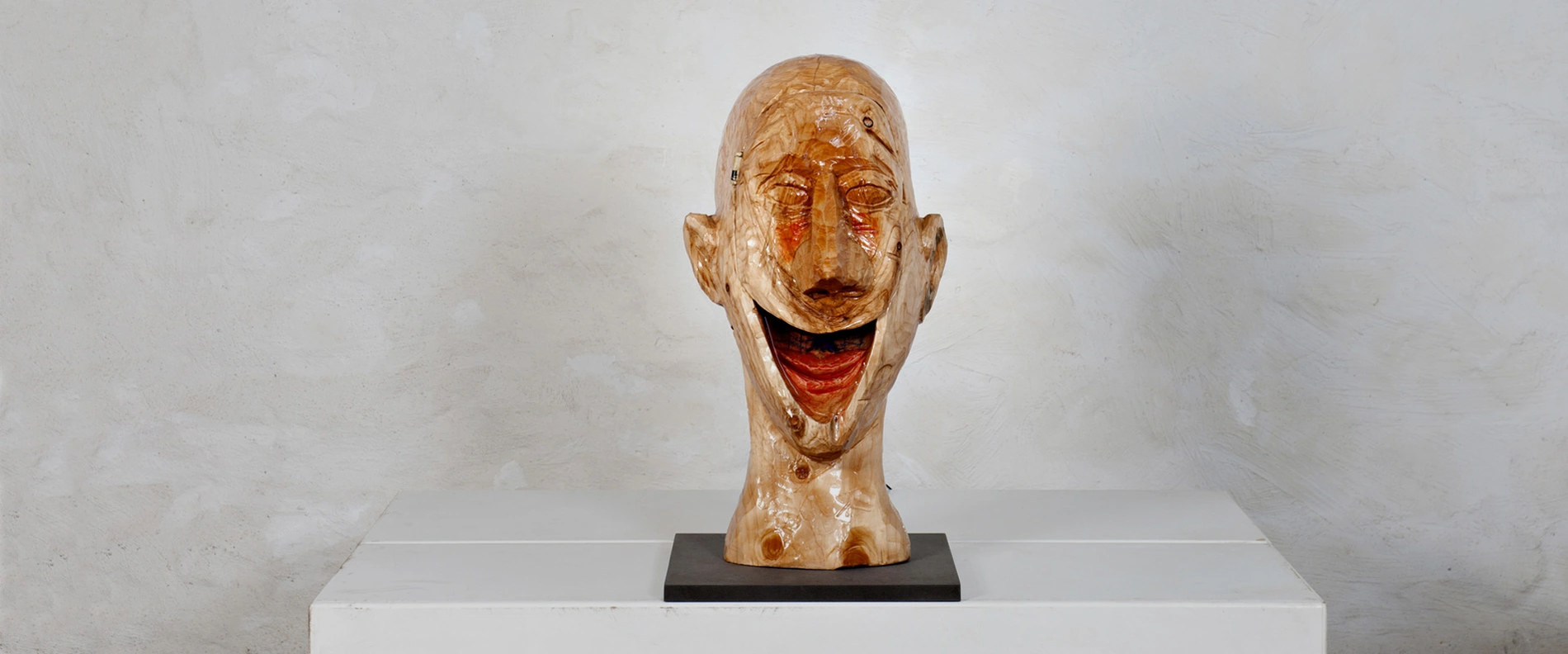 Artist Brele Scholz remoulds wooden European Heads with cast resin