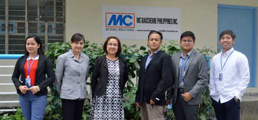 Group picture of the MC-Bauchemie Philippines Inc. team with Managing Director Shirley Laurel (3rd from left) in front of the company building in Manila.