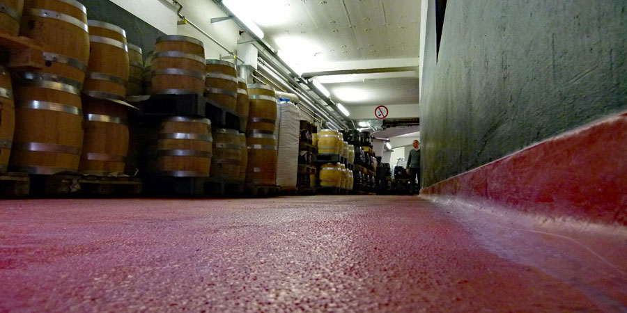 View inside a brewery: MC-DUR PowerCoat, the new PU/mineral hybrid floor from MC-Bauchemie, retains its functionality even with regular hot water and chemical cleaning. It also effectively withstands high point loads from pallets, etc., such as occur in a brewery. MC-DUR PowerCoat is an ideal floor covering for the food and chemical industries, in vehicle washing facilities and tank cleaning plants, and wherever floors are exposed to extreme conditions due to mechanical stress, aggressive substances and/or strong temperature fluctuations.